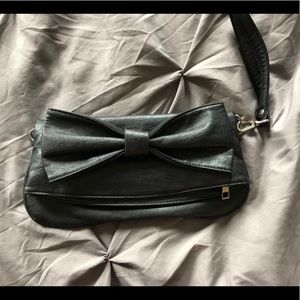 Fold over faux leather clutch